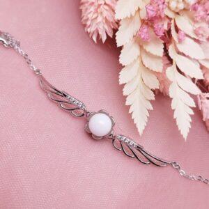 Bracelet L'ailé artisanal en lait maternel résiné blanc sur chaîne fine