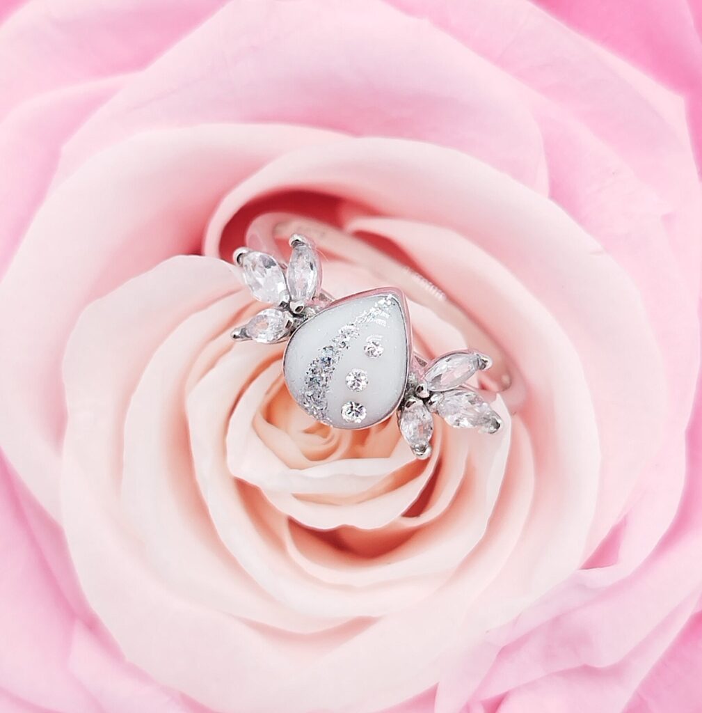 Fond rose décoratif bijoux lait maternel Douce Symbiose