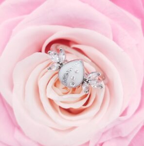 Fond rose décoratif bijoux lait maternel Douce Symbiose